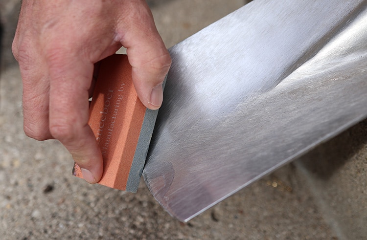 Sharpen the blade using a whetstone