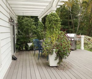 Clean up messy decks with a pressure washer.