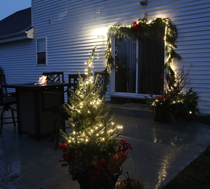 fire table with holiday decorations