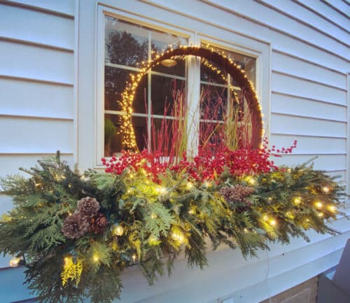 faux red berries in window box